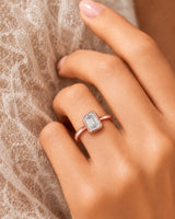 Golden Horizon natural emerald cut diamond bezel engagement ring worn on hand in white gold | SARATTI