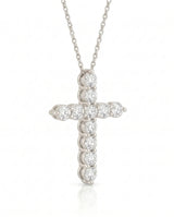Side profile of Grande Lueur Croix diamond cross pendant in platinum | SARATTI
