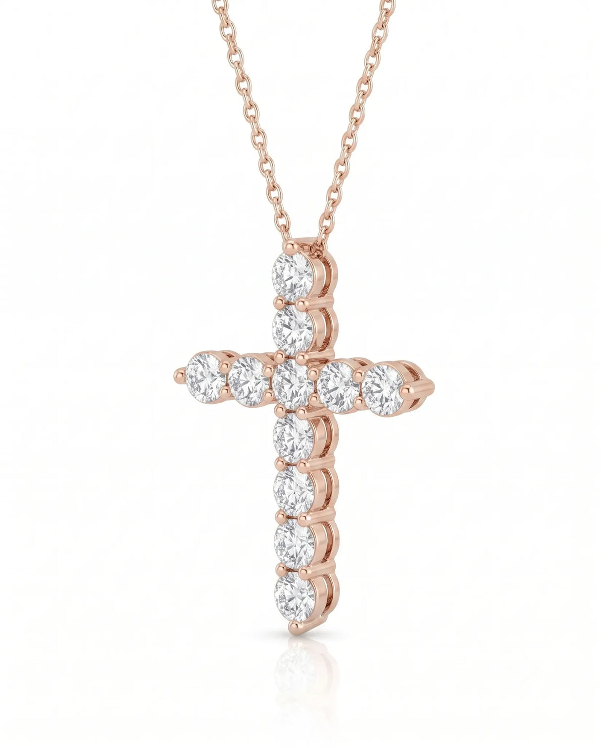 45-degree view of Grande Lueur Croix diamond cross necklace in rose gold | SARATTI