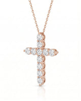 45-degree view of Grande Lueur Croix diamond cross necklace in rose gold | SARATTI