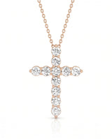 Front view of Grande Lueur Croix round diamond cross necklace in rose gold | SARATTI