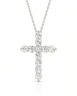 Front view of Grande Lueur Croix round diamond cross necklace in white gold | SARATTI