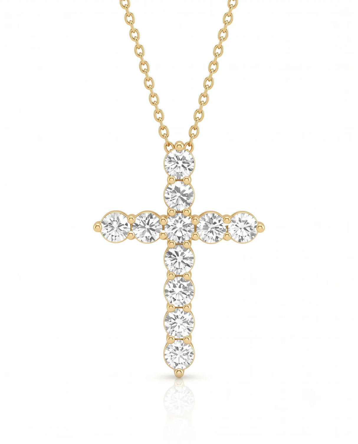 Front view of Grande Lueur Croix round diamond cross necklace in yellow gold | SARATTI