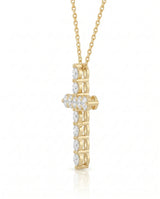 Side profile of Grande Lueur Croix diamond cross pendant in yellow gold | SARATTI