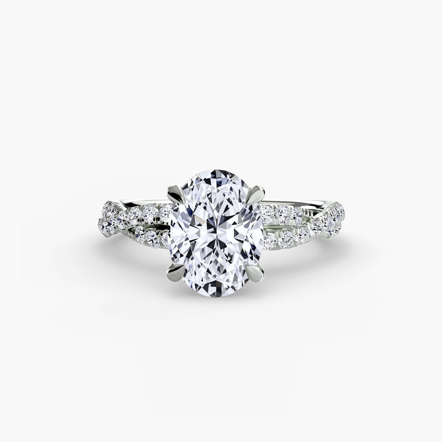 INFINITIÉ Oval Cut twisted pavé solitaire ring setting in White Gold | SARATTI