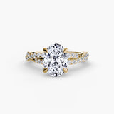 INFINITIÉ Oval Cut twisted pavé solitaire ring setting in Yellow Gold | SARATTI