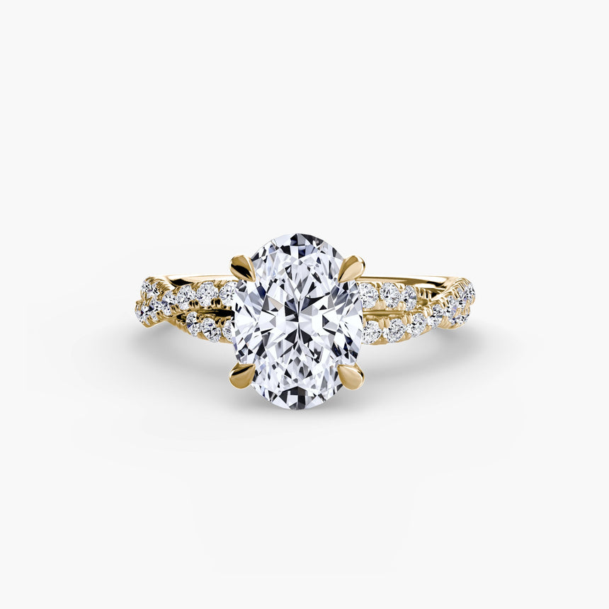 INFINITIÉ Oval Cut twisted pavé solitaire ring setting in Yellow Gold | SARATTI