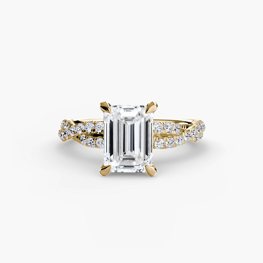 INFINITIÉ Emerald Cut twisted pavé solitaire ring setting in Yellow Gold | SARATTI