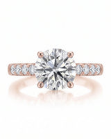 Jelena 1 carat F-colour oval natural diamond pavé solitaire ring in 18K rose gold, front view of oval centre and pavé shoulders | SARATTI