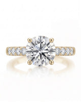 Jelena 1 carat F-colour oval natural diamond pavé solitaire ring in 18K yellow gold, front view of oval centre and pavé shoulders | SARATTI