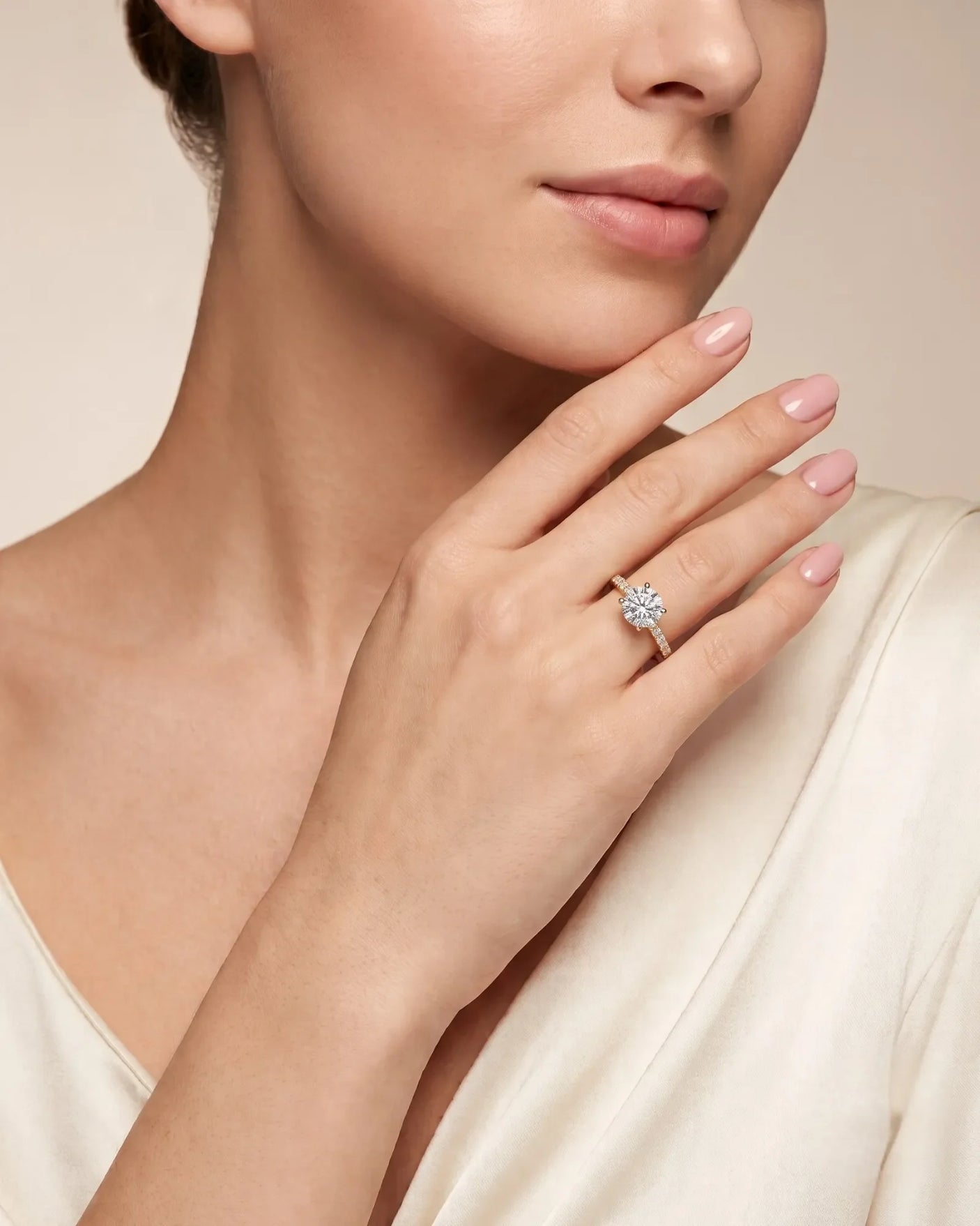 Jelena 1 carat F-colour oval natural diamond pavé solitaire ring in 18K yellow gold, worn on hand | SARATTI