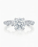 Joan 1 carat round natural diamond six-prong engagement ring in 18K white gold, front view | SARATTI