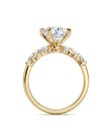 Joan 1 carat round natural diamond six-prong engagement ring in 18K yellow gold, side profile | SARATTI
