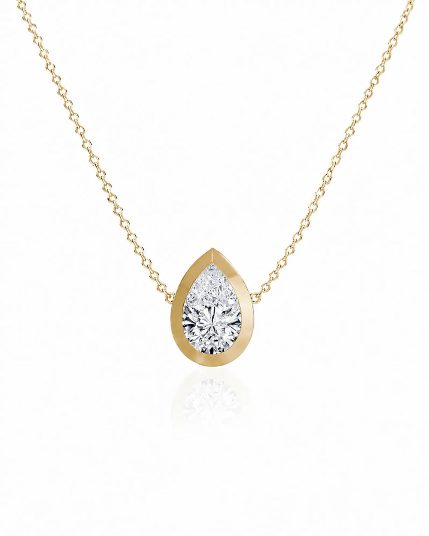 SOLARA Bezel-Set Pear Cut solitaire necklace setting in yellow gold, front view | SARATTI
