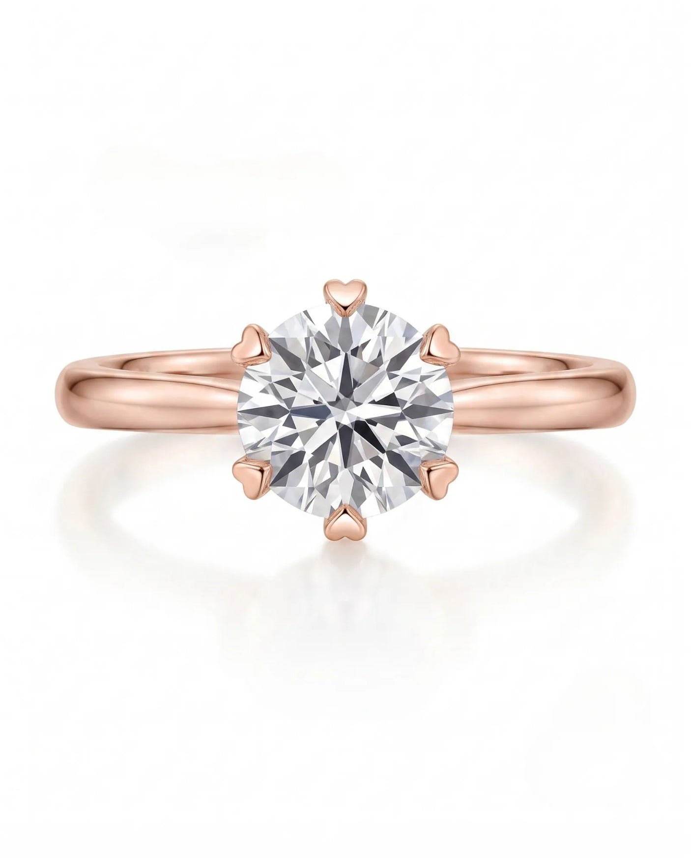 KATYA 1 carat round natural diamond heart-prong solitaire ring in 18K rose gold, front view of six heart-shaped prongs | SARATTI