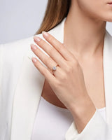 KATYA 1 carat round natural diamond heart-prong solitaire ring in 18K rose gold, worn on hand | SARATTI
