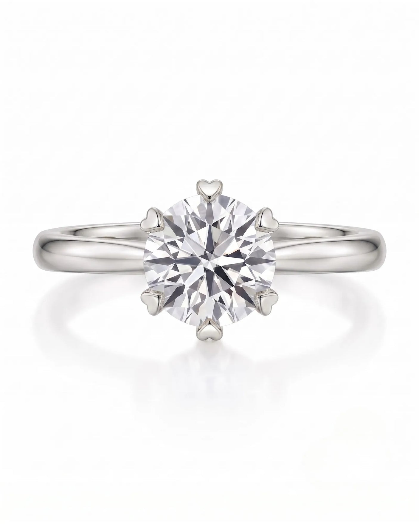 KATYA 1 carat round natural diamond heart-prong solitaire ring in 18K white gold, front view of six heart-shaped prongs | SARATTI