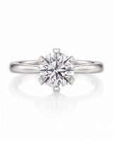 KATYA 1 carat round natural diamond heart-prong solitaire ring in 18K white gold, front view of six heart-shaped prongs | SARATTI