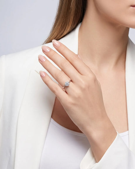 KATYA 1 carat round natural diamond heart-prong solitaire ring in 18K white gold, worn on hand | SARATTI