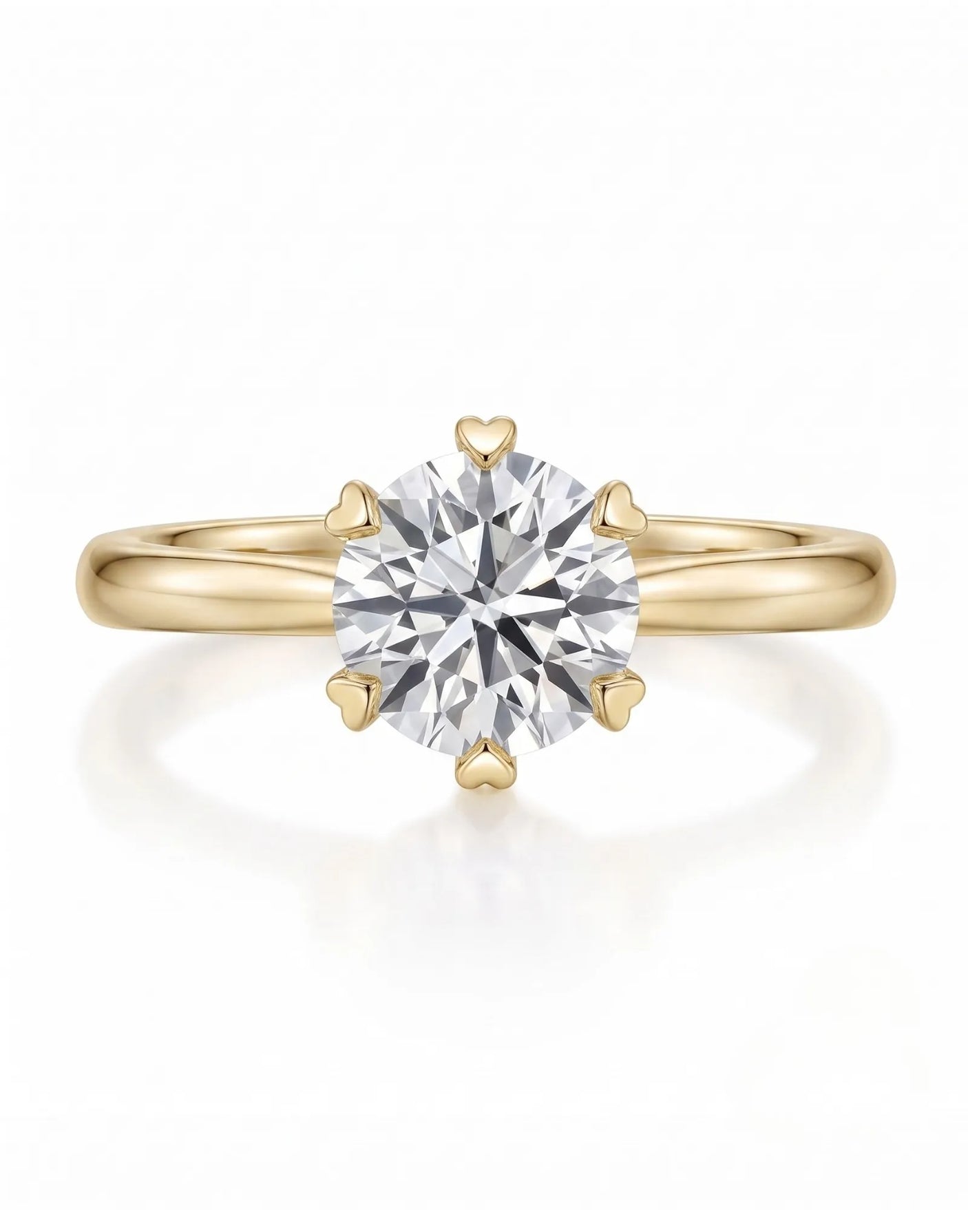 KATYA 1 carat round natural diamond heart-prong solitaire ring in 18K yellow gold, front view of six heart-shaped prongs | SARATTI
