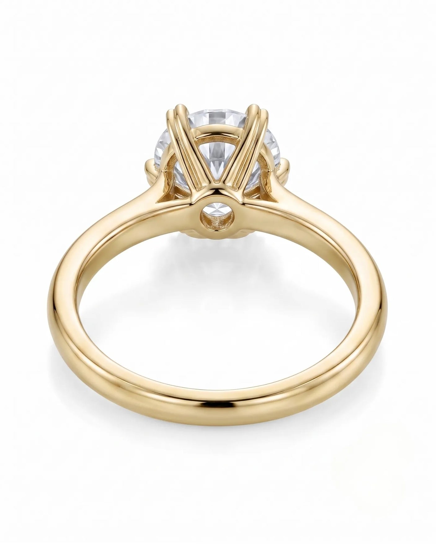 KATYA 1 carat round natural diamond heart-prong solitaire ring in 18K yellow gold, underside view of heart-shaped six-prong crown | SARATTI