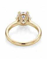 KATYA 1 carat round natural diamond heart-prong solitaire ring in 18K yellow gold, underside view of heart-shaped six-prong crown | SARATTI