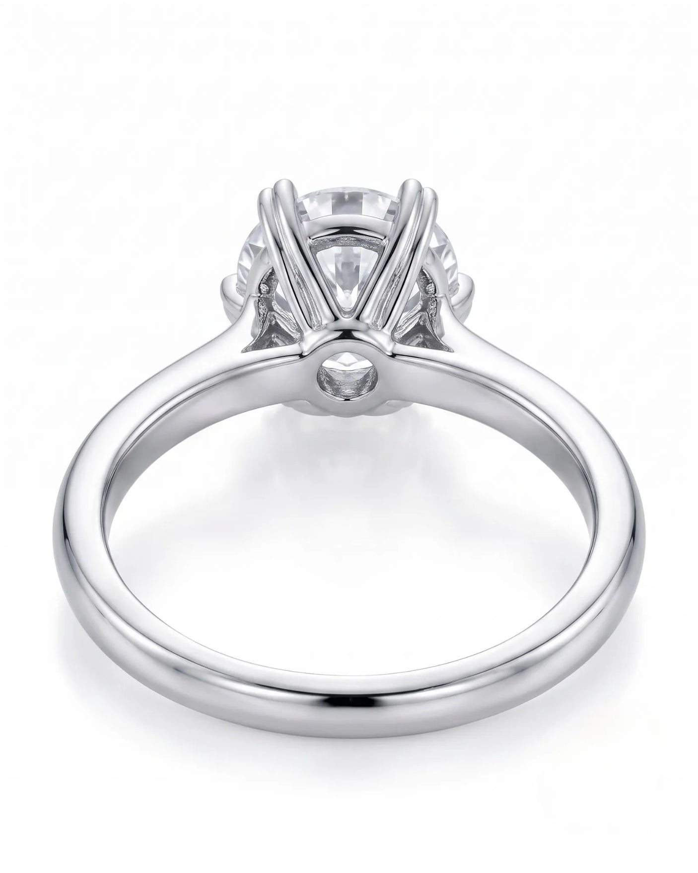 KATYA 1 carat round natural diamond heart-prong solitaire ring in platinum, underside view of heart-shaped six-prong crown | SARATTI