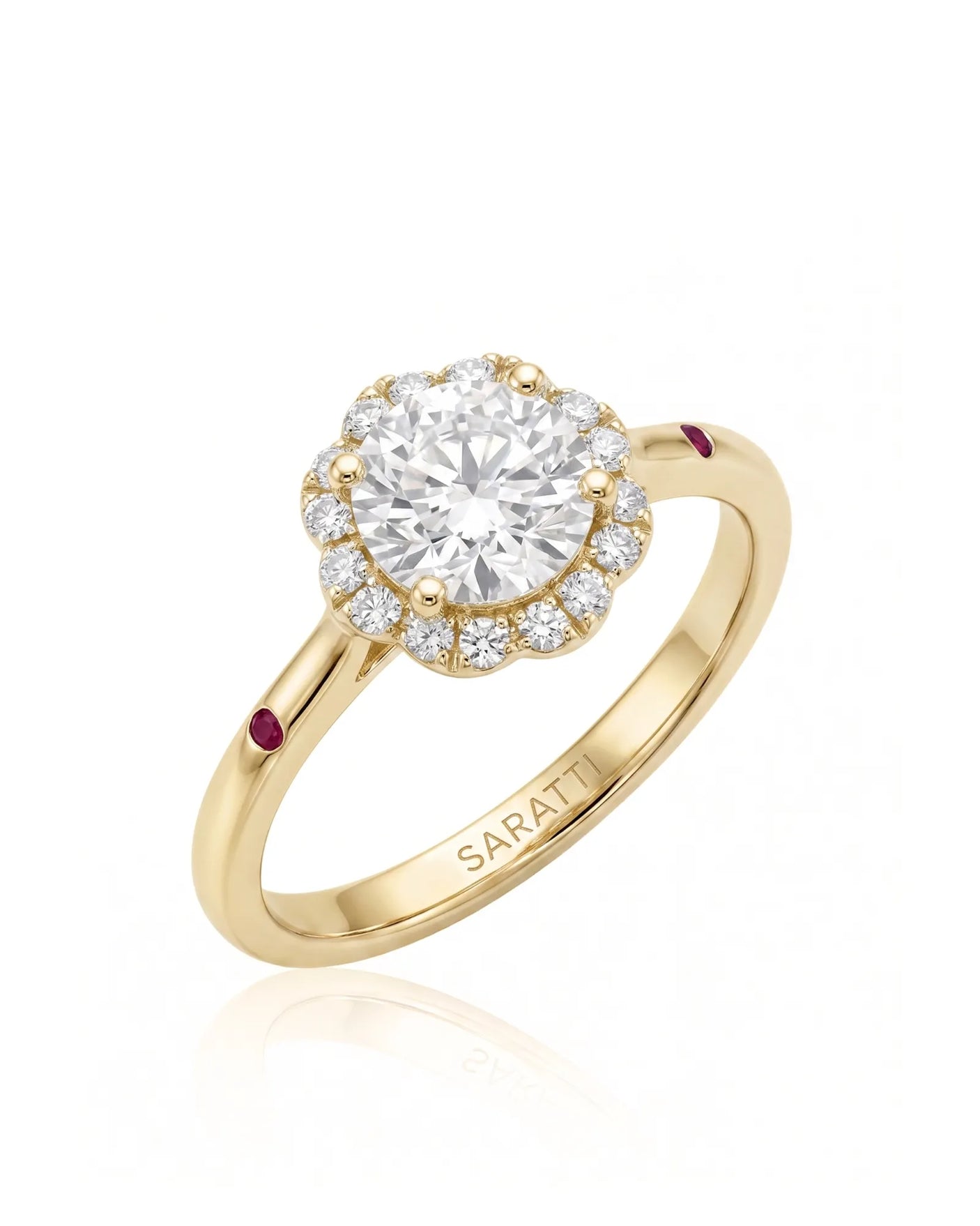 LILA 1 carat round natural diamond halo engagement ring with natural ruby shoulder accents in 18K yellow gold, 45-degree view | SARATTI