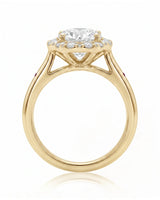 LILA 1 carat round natural diamond halo engagement ring with natural ruby shoulder accents in 18K yellow gold, side profile showing four-prong crown and open gallery | SARATTI