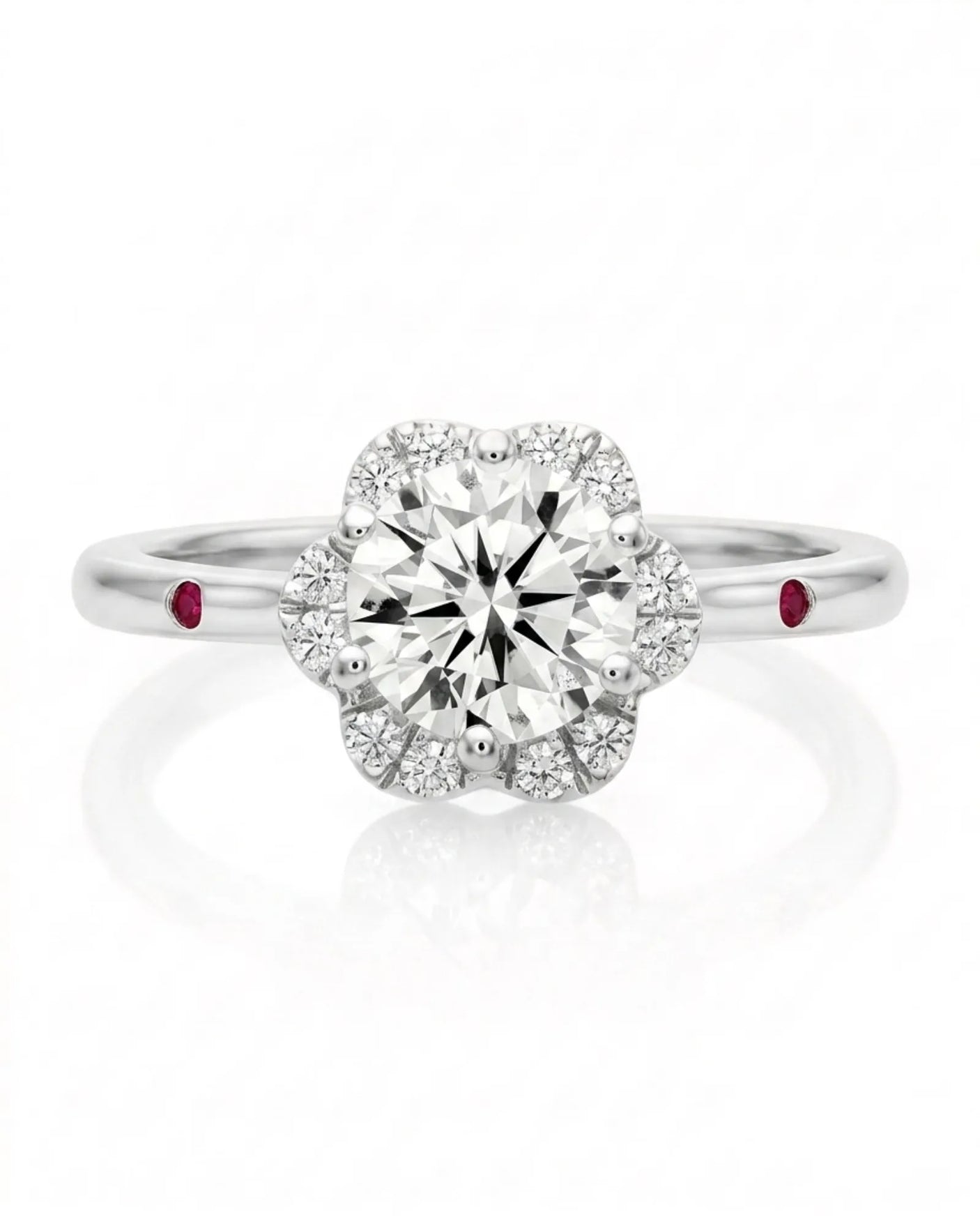 LILA 1 carat round natural diamond halo engagement ring with natural ruby shoulder accents in platinum, front view of floral diamond halo | SARATTI