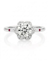 LILA 1 carat round natural diamond halo engagement ring with natural ruby shoulder accents in platinum, front view of floral diamond halo | SARATTI