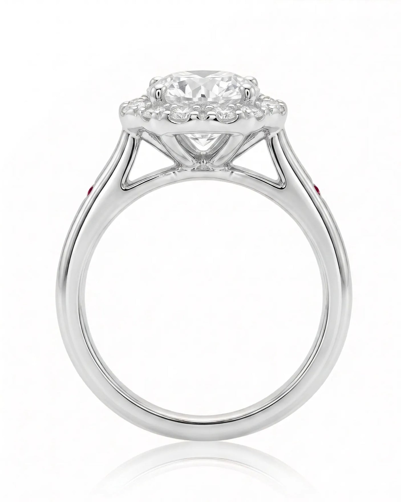 LILA 1 carat round natural diamond halo engagement ring with natural ruby shoulder accents in platinum, side profile showing four-prong crown and open gallery | SARATTI