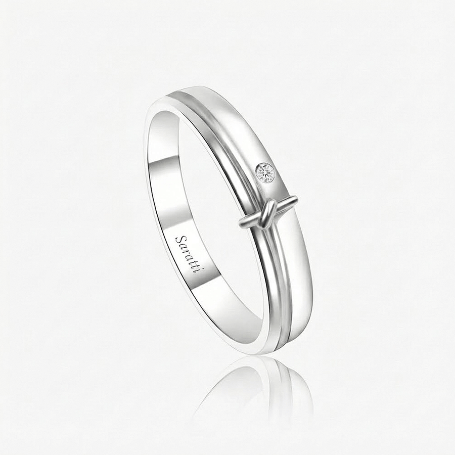 The Love Note Diamond Solitaire Band in 18K white gold with 0.03ct bezel-set round diamond knot detail | SARATTI