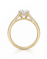 LUCIA 1 carat round natural diamond split-shank engagement ring with pavé shoulders in 18K yellow gold, side profile showing four-prong crown and open gallery | SARATTI