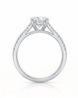 LUCIA 1 carat round natural diamond split-shank engagement ring with pavé shoulders in platinum, side profile showing four-prong crown and open gallery | SARATTI