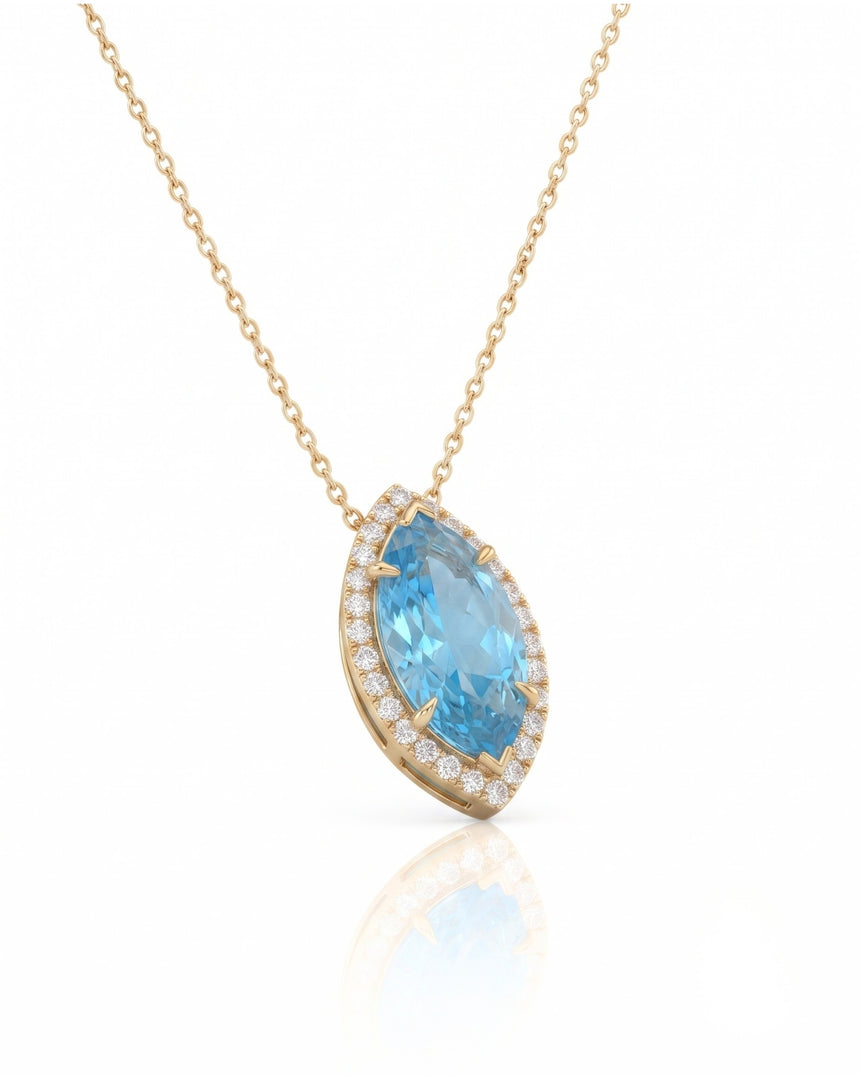 LUMÉA marquise cut Aquamarine diamond halo pendant necklace in Yellow Gold, 45-degree view | SARATTI