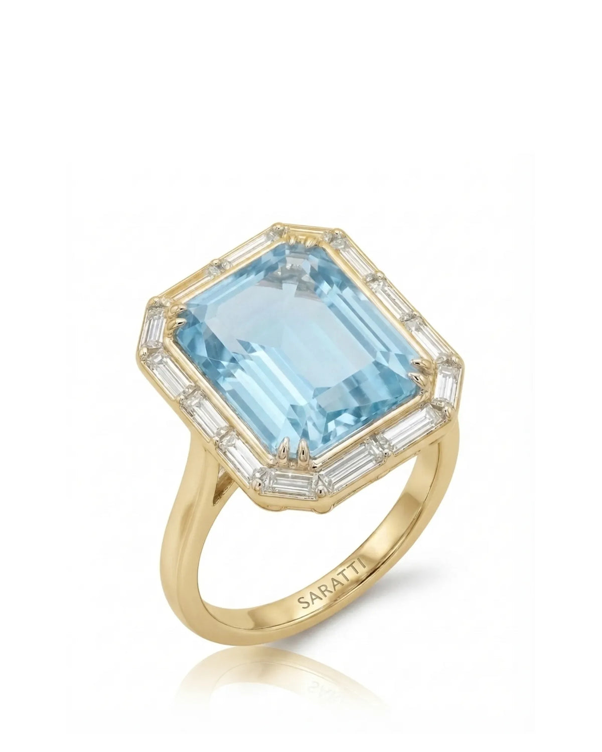 Lumière Octave emerald-cut Aquamarine baguette diamond halo ring setting in yellow gold, 45-degree view | SARATTI