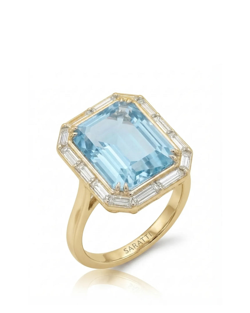 Lumière Octave emerald-cut Aquamarine baguette diamond halo ring setting in yellow gold, 45-degree view | SARATTI