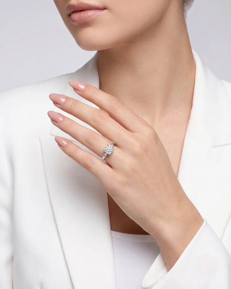 LUNA 1 carat round natural diamond four-prong engagement ring with natural diamond shoulders in 18K white gold, worn on hand | SARATTI