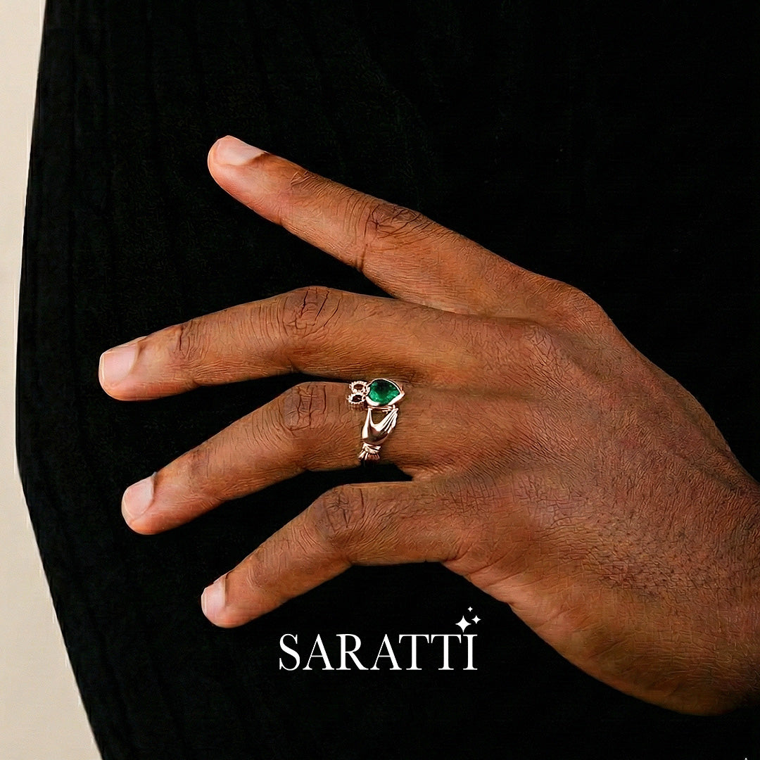 luxury emerald claddagh ring with diamond shoulders in white gold | SARATTI
