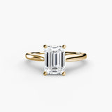LYRA Emerald Cut twisted shoulder solitaire ring setting in Yellow Gold | SARATTI