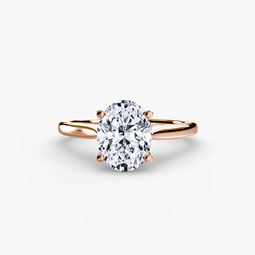 LYRA Oval Cut twisted shoulder solitaire ring setting in Rose Gold | SARATTI