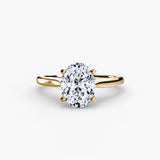 LYRA Oval Cut twisted shoulder solitaire ring setting in Yellow Gold | SARATTI
