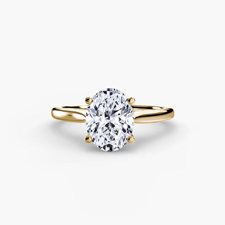 LYRA Oval Cut twisted shoulder solitaire ring setting in Yellow Gold | SARATTI