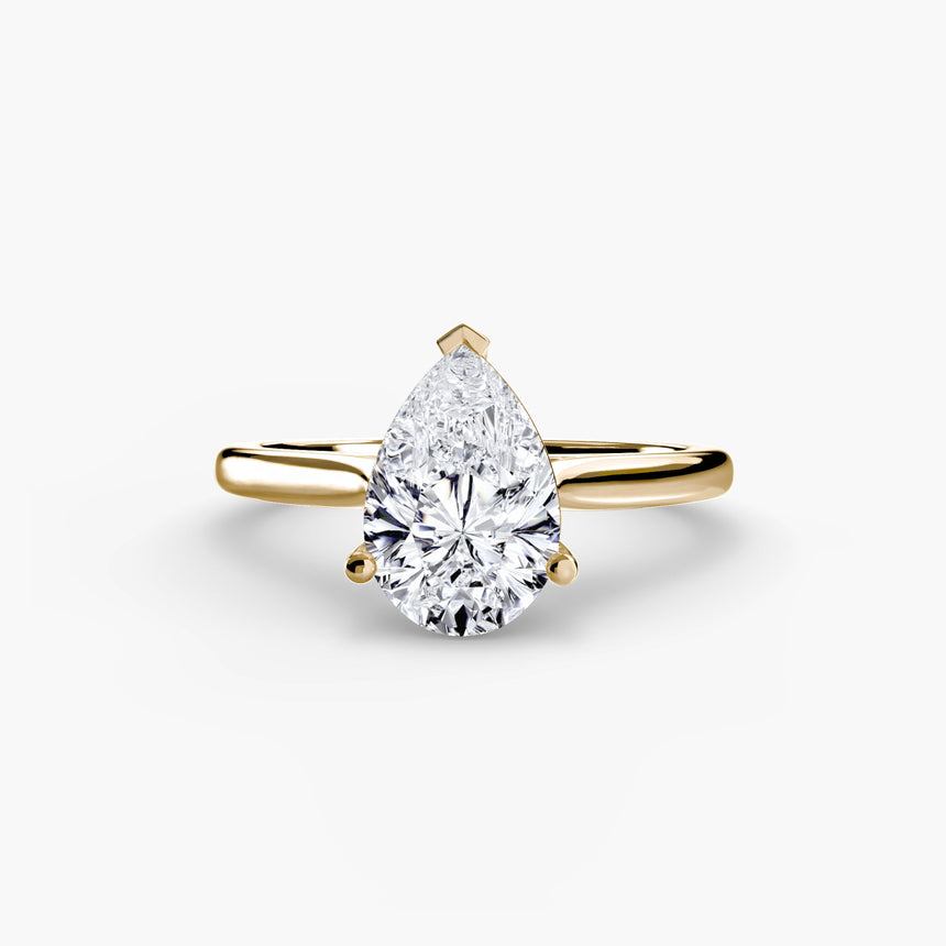 LYRA – Pear Cut Twisted Shoulder Solitaire Ring Setting in Yellow Gold | SARATTI