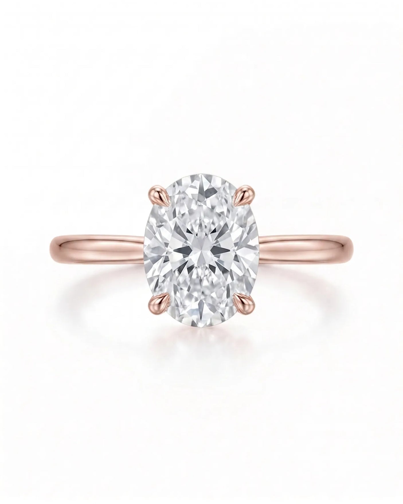MIA 1 carat F-colour oval natural diamond cathedral solitaire ring in 18K rose gold, front view of four-prong centre | SARATTI