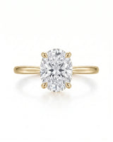 MIA 1 carat F-colour oval natural diamond cathedral solitaire ring in 18K yellow gold, front view of four-prong centre | SARATTI