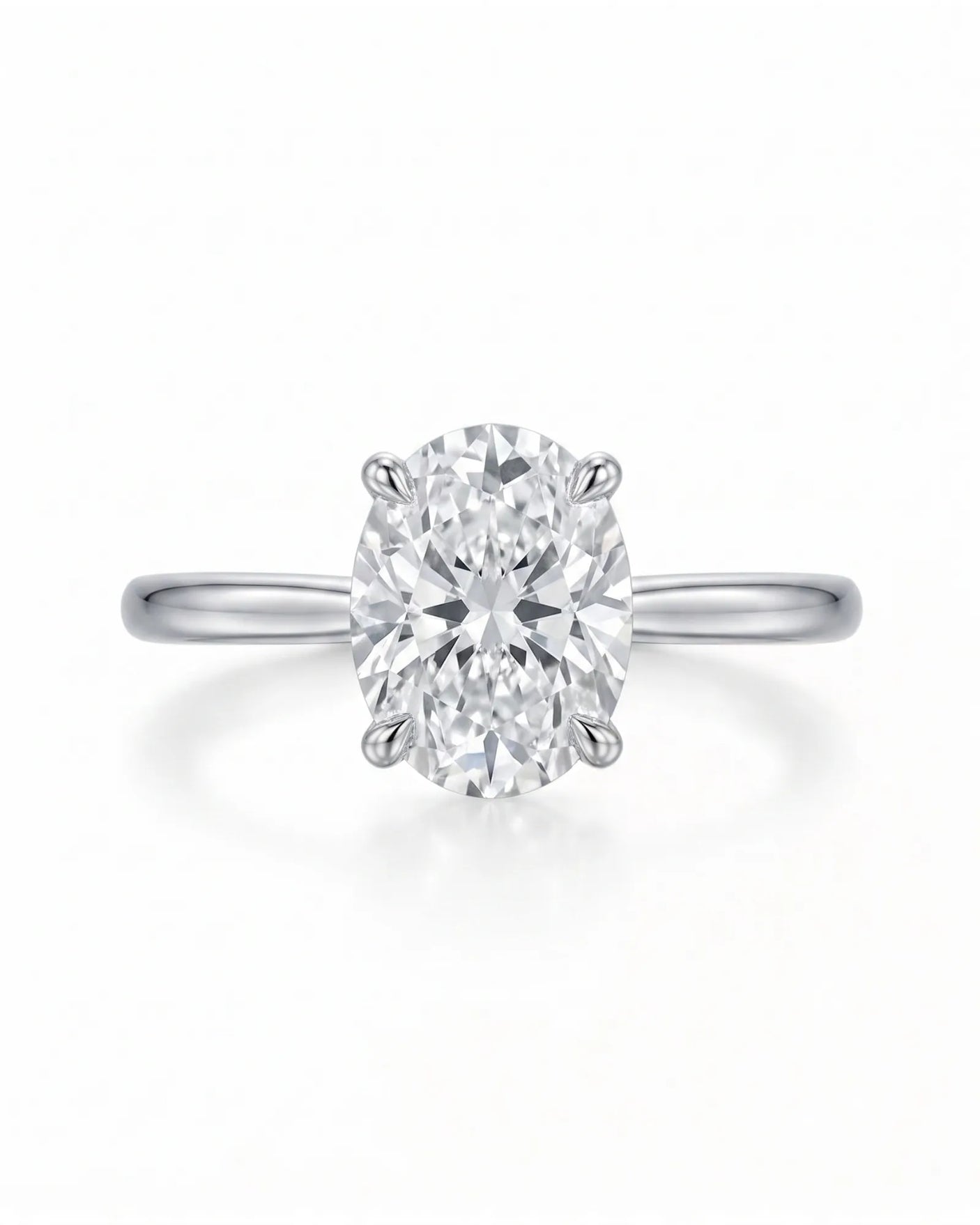 MIA 1 carat F-colour oval natural diamond cathedral solitaire ring in platinum, front view of four-prong centre | SARATTI