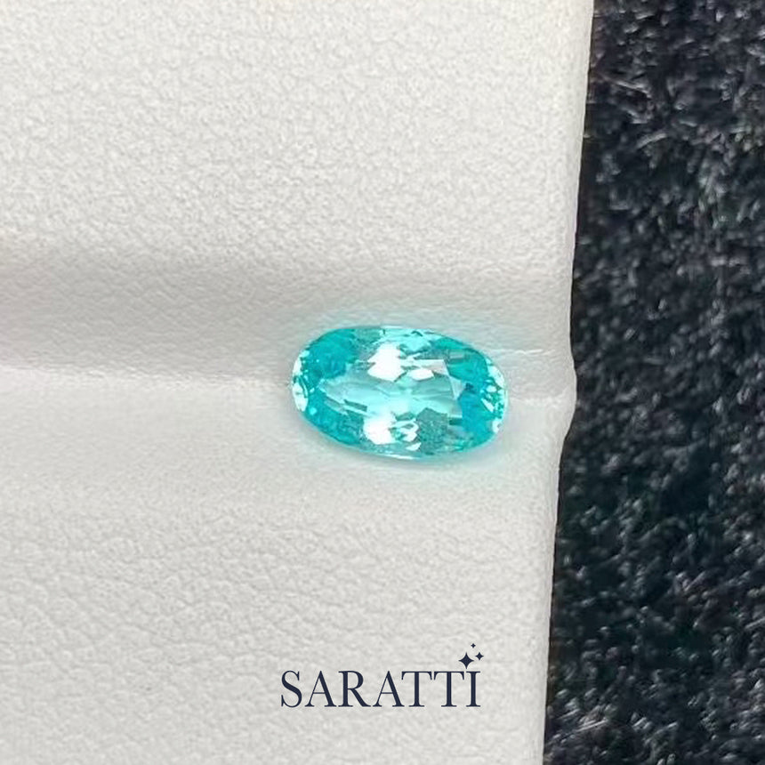 natural blue tourmaline oval shape small loose gemstone detail shot | SARATTI