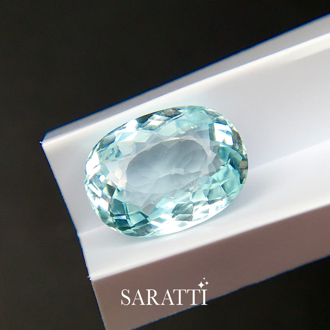 natural light blue tourmaline oval shape loose gemstone detail shot | SARATTI